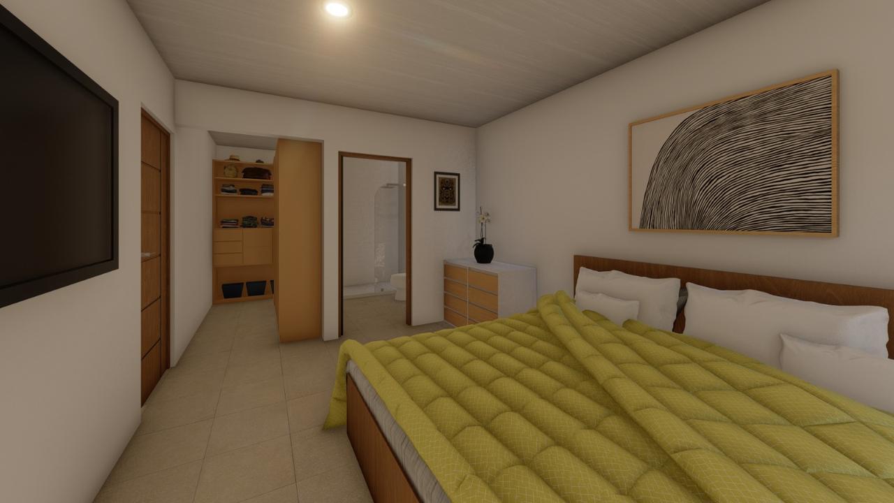 Dormitorio principal con walk-in closet y baño integrado
